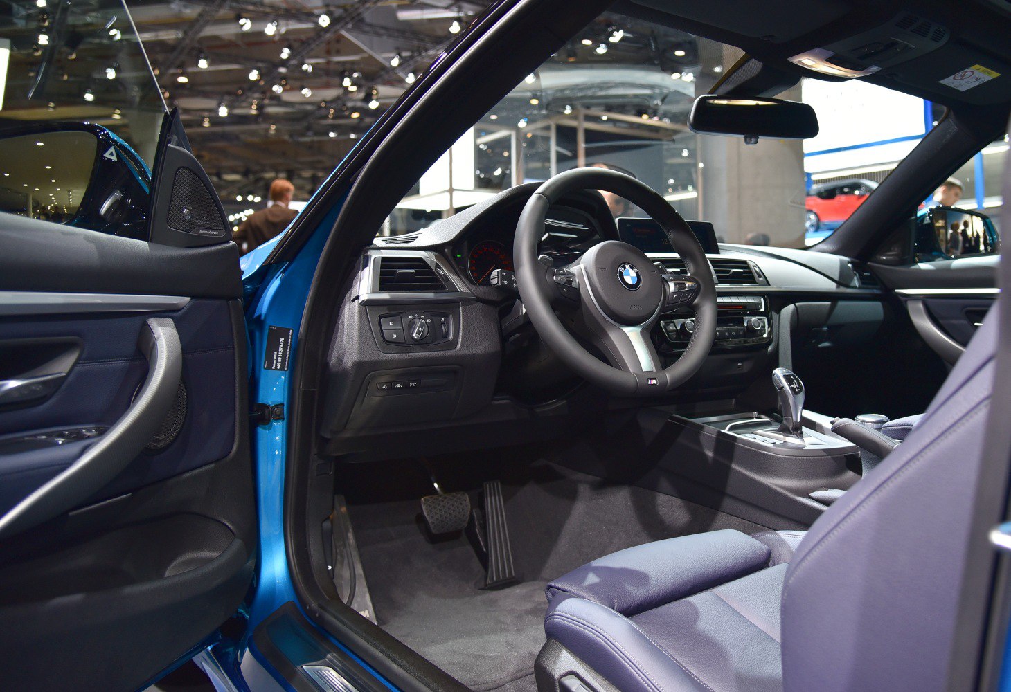 Modern luxury car interior with dashboard and steering wheel