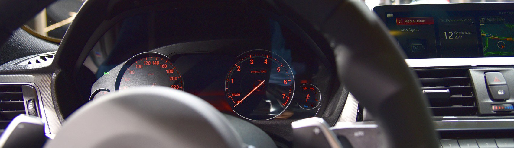 Instrument cluster and digital media display in car dashboard