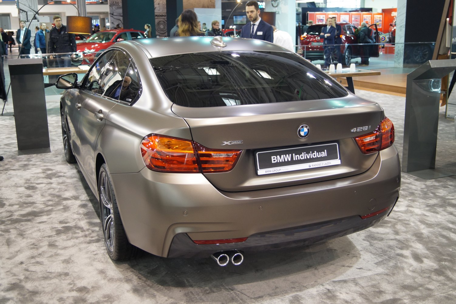 Rear view with dual exhaust and matte paint finish