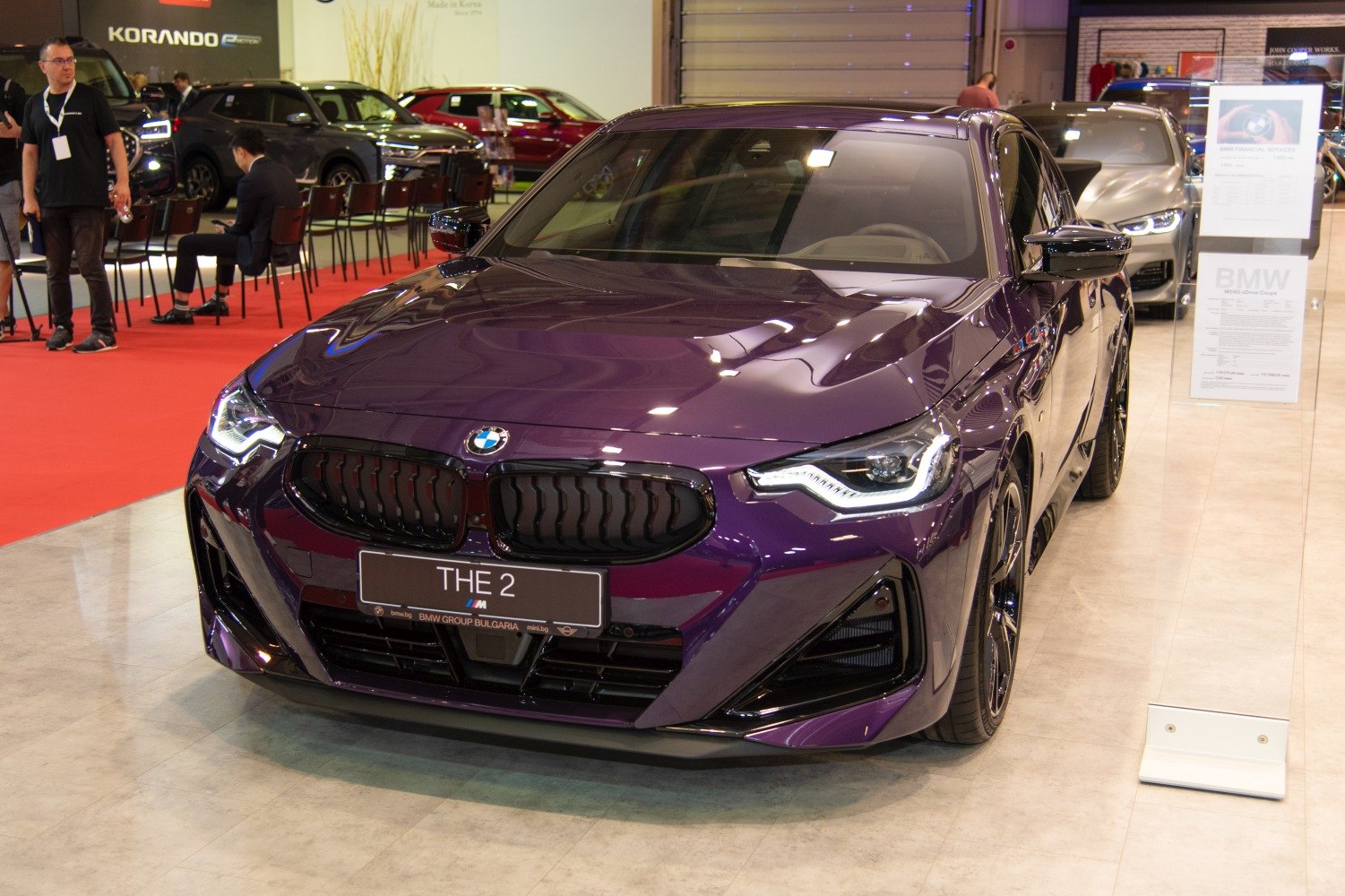 Close-up of front grille and LED headlights of a coupe