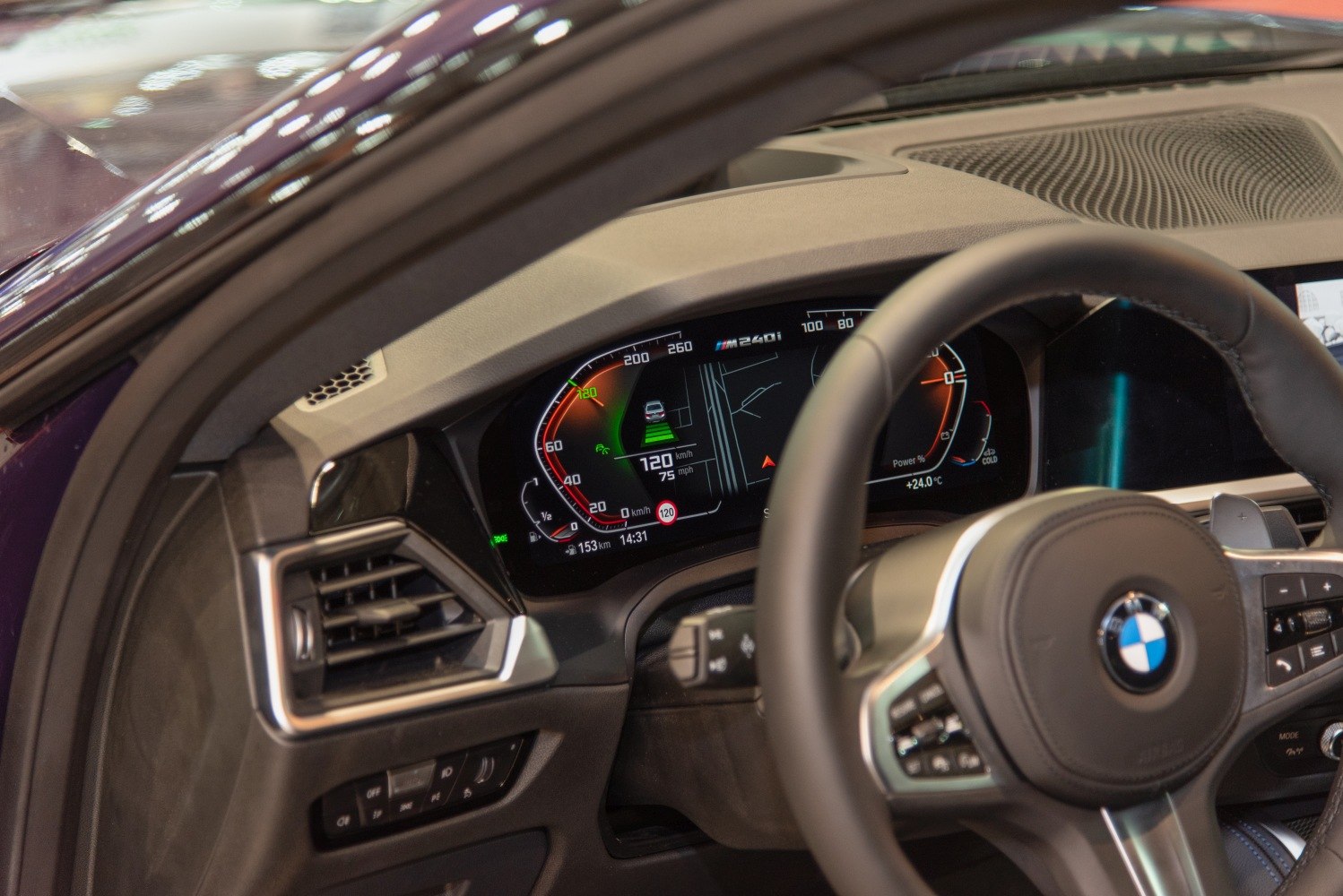 Digital instrument cluster and multifunction steering wheel