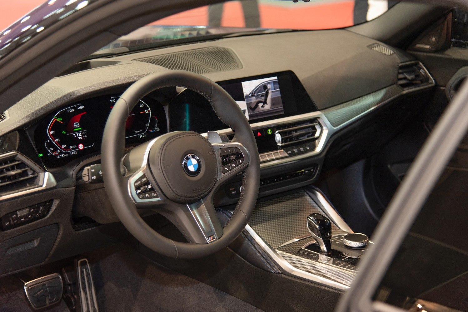 Dashboard, digital instrument cluster, steering wheel, gear selector