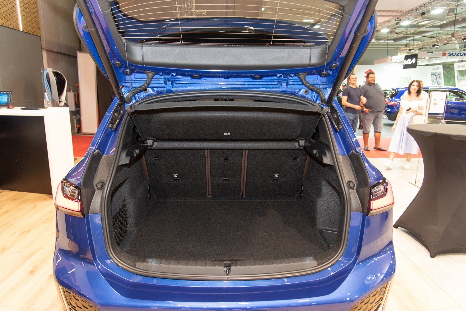 Open rear trunk with spacious cargo area and split-folding seats