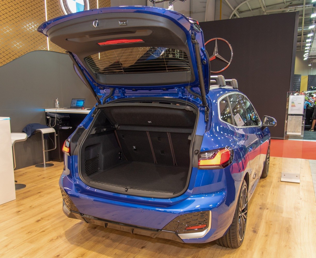 Spacious rear cargo area with open tailgate in a compact SUV