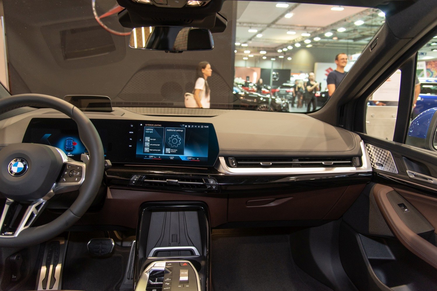 Interior dashboard with digital displays and controls.