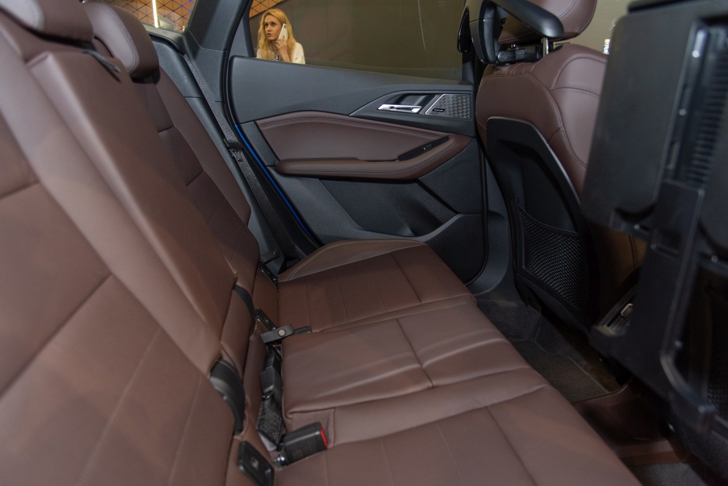 Brown leather rear seats and door panel interior