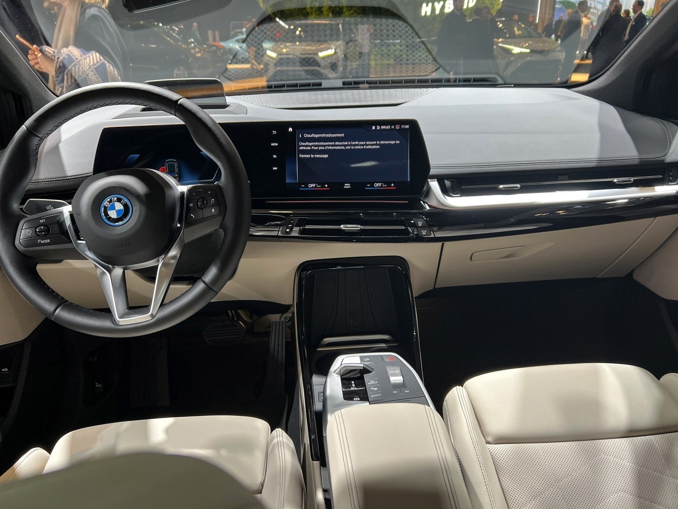 Modern car interior with steering wheel and digital dashboard display