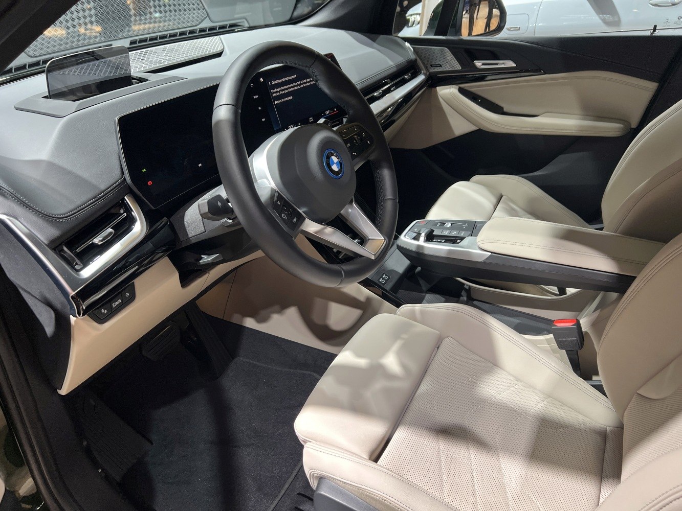 Luxury beige leather seats and digital dashboard in car interior