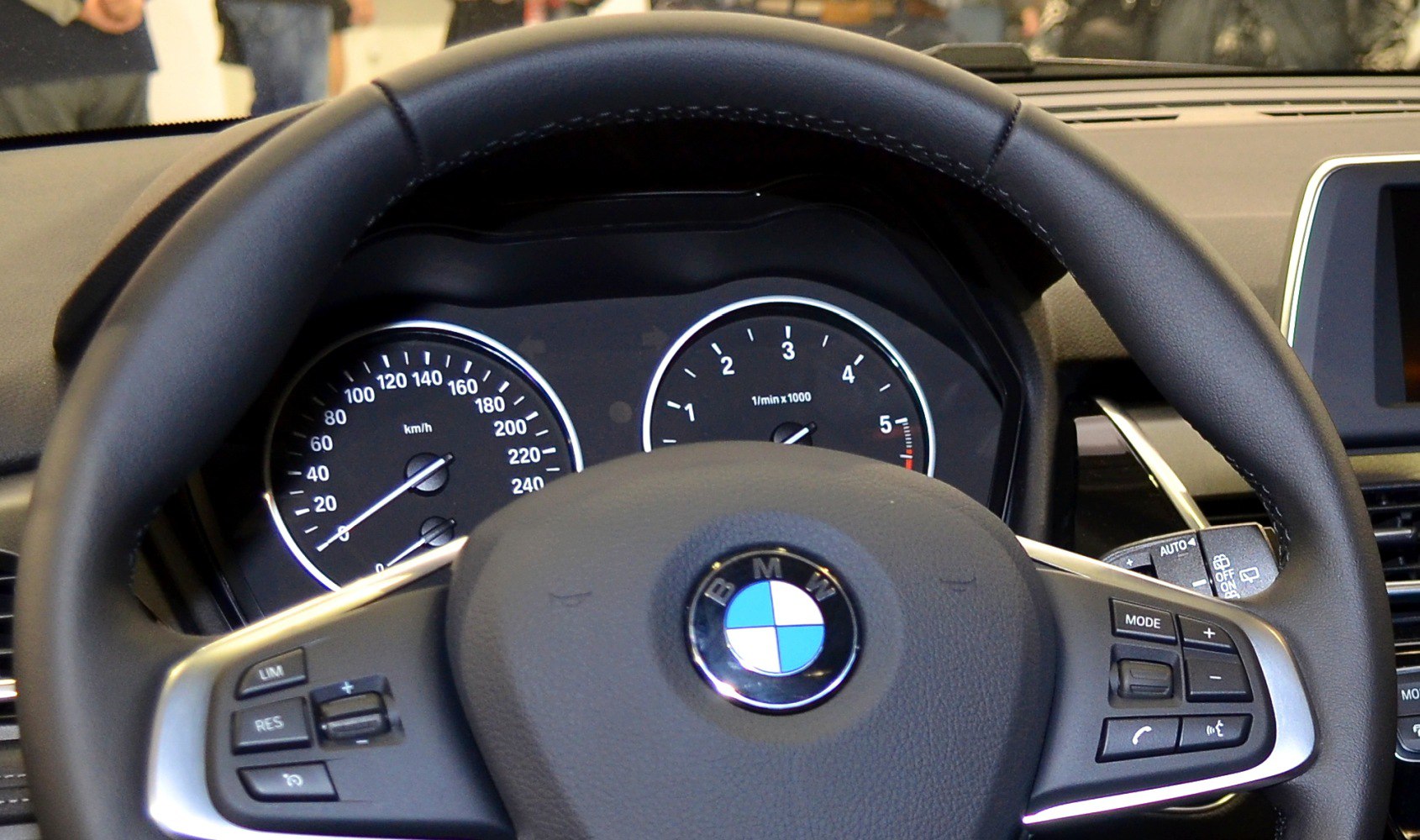 BMW steering wheel with controls and instrument cluster