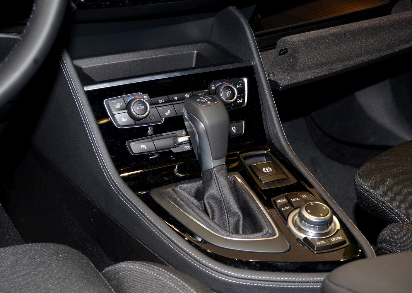 Center console with gear shifter and climate controls