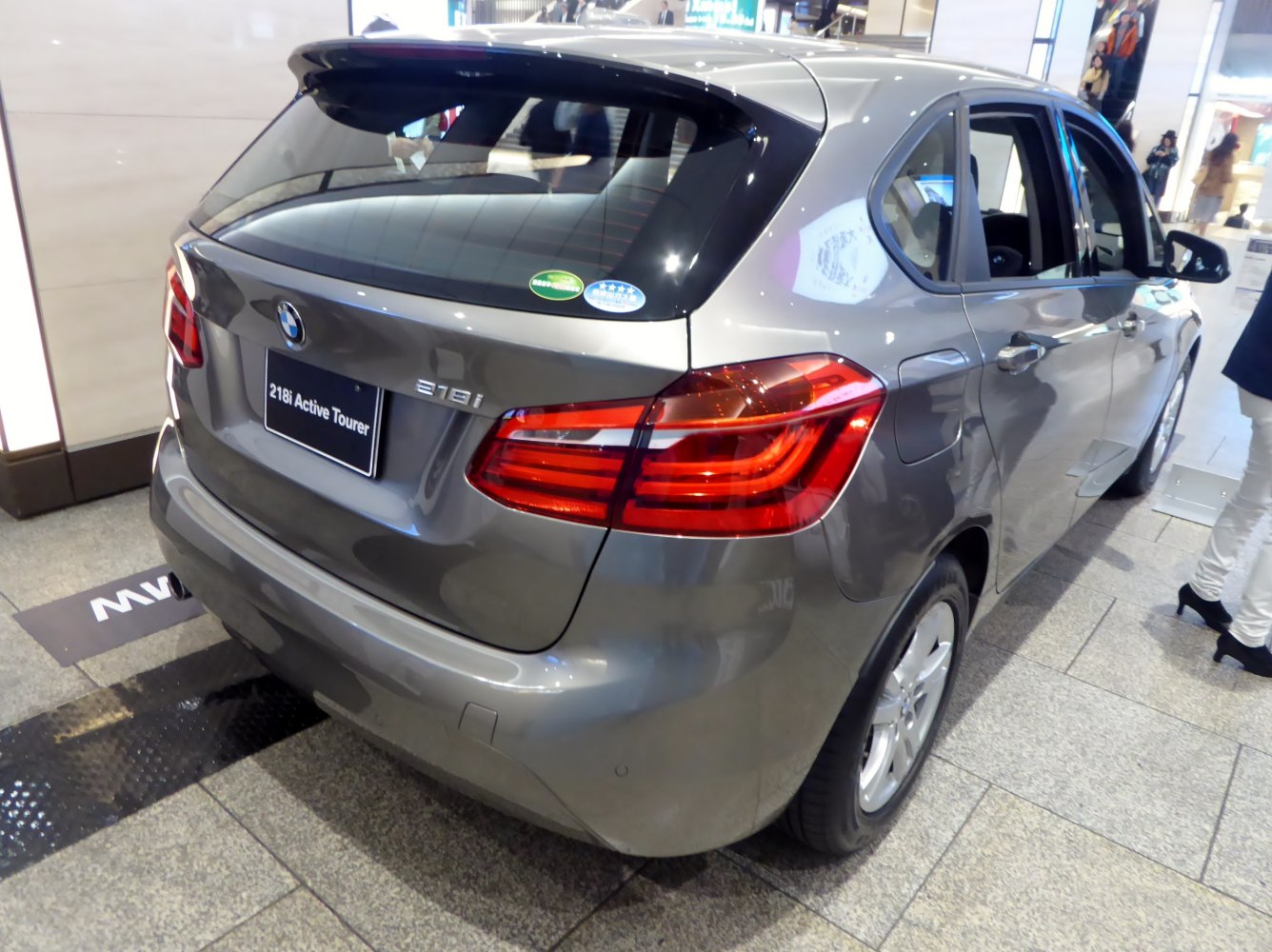 Rear view of hatchback showing taillights and rear window design