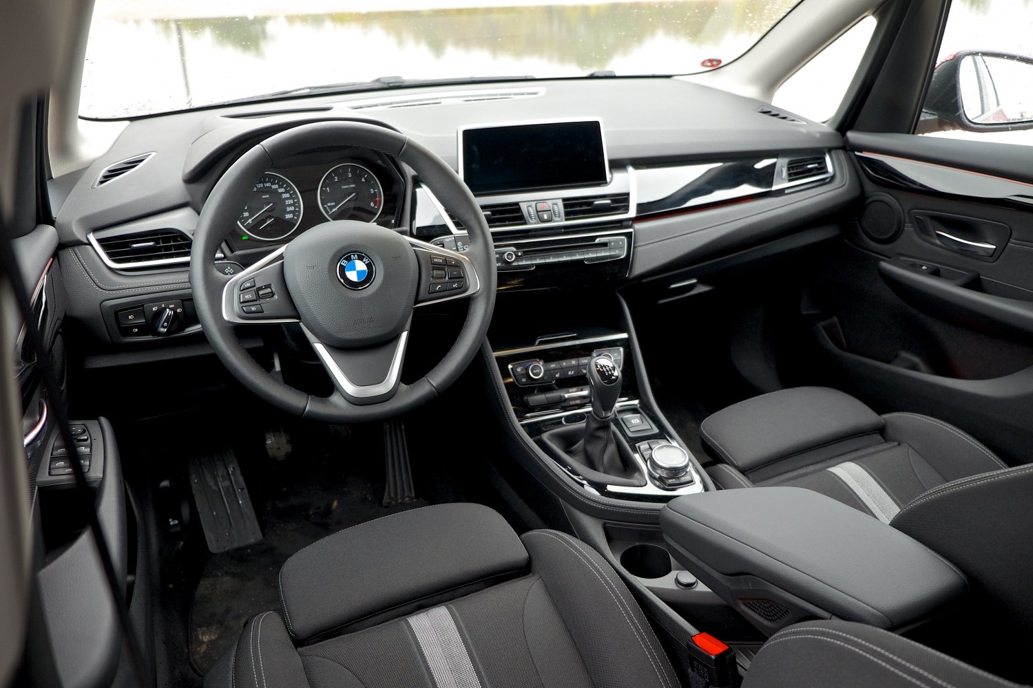 Interior dashboard and center console with manual transmission