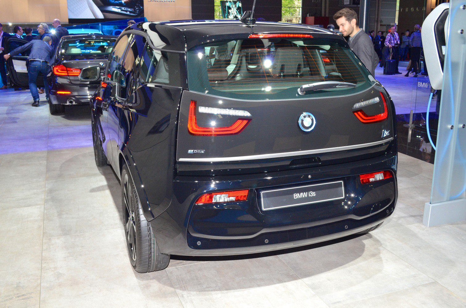 Rear view with LED taillights, rear wiper, sleek hatchback design