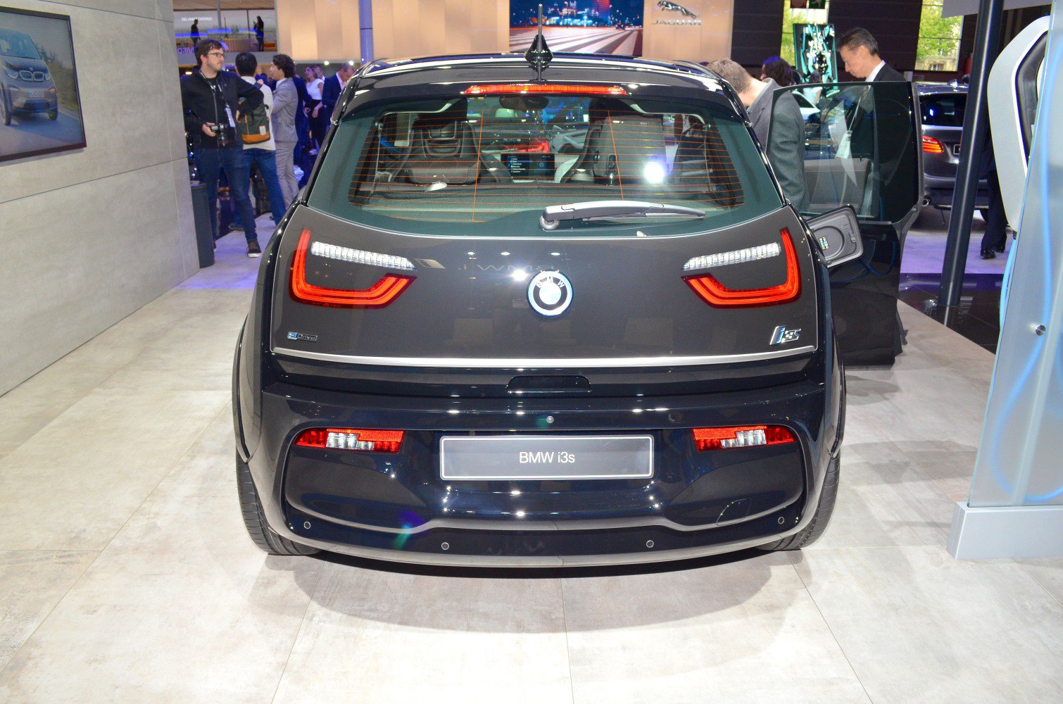 Rear view of electric hatchback with unique taillights and compact design.