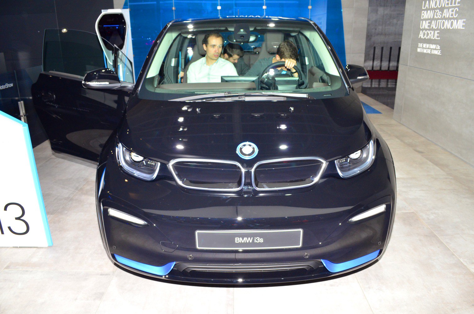 Front view of electric hatchback with distinctive grille and headlights