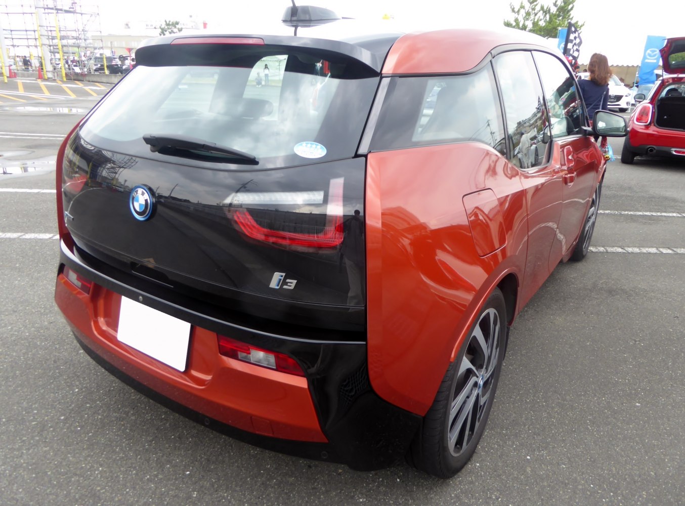 Rear view of two-tone hatchback with distinct LED taillights