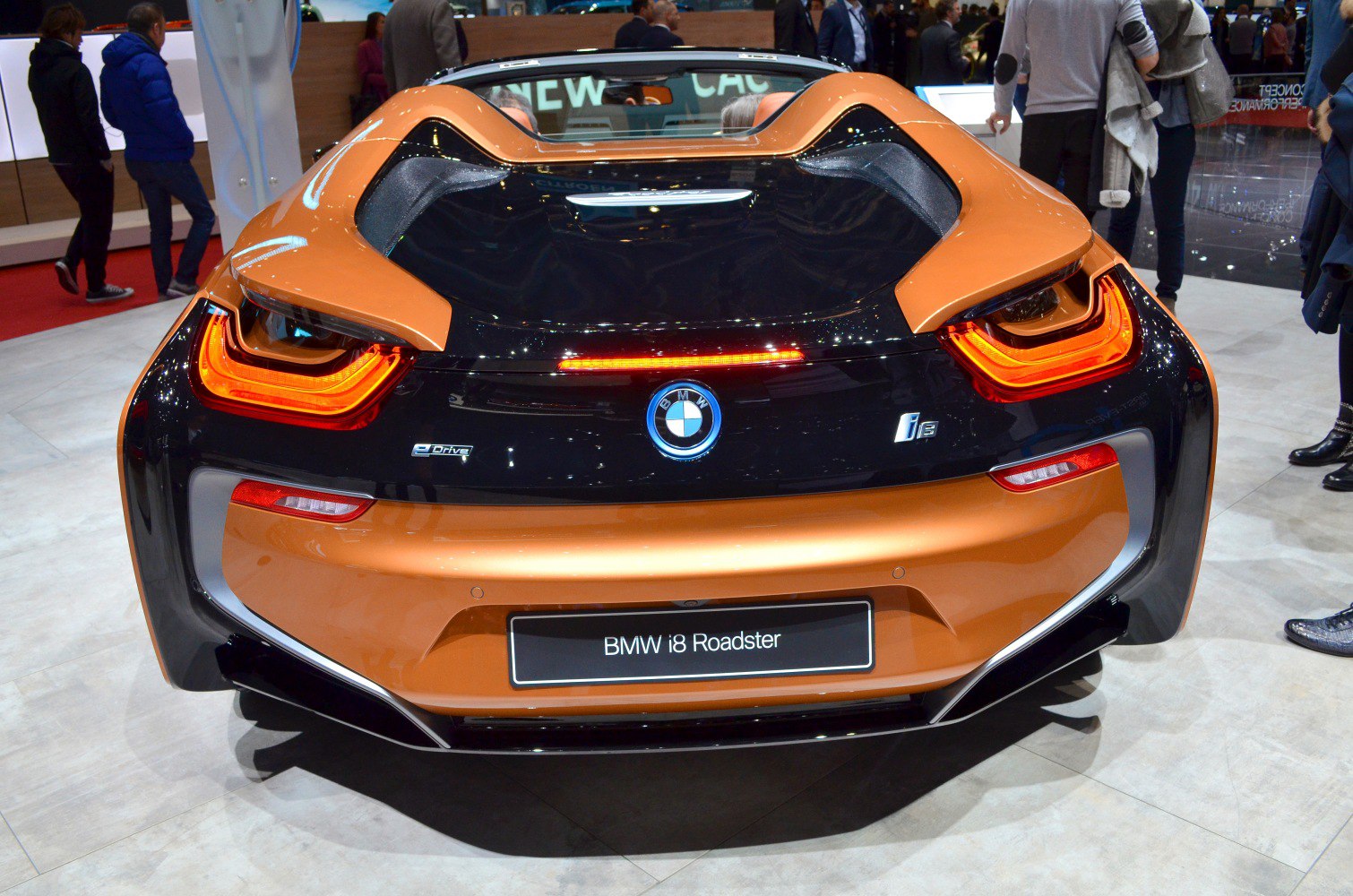 Rear view of hybrid sports car with distinctive tail lights and aerodynamic design