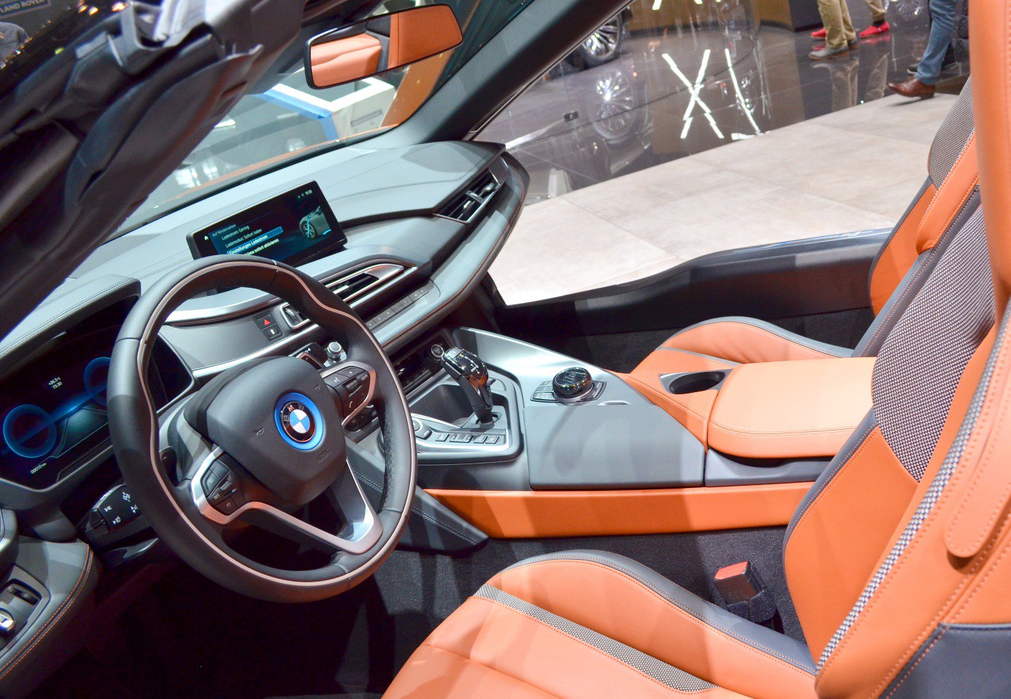 Modern BMW car interior with digital dash and leather seats