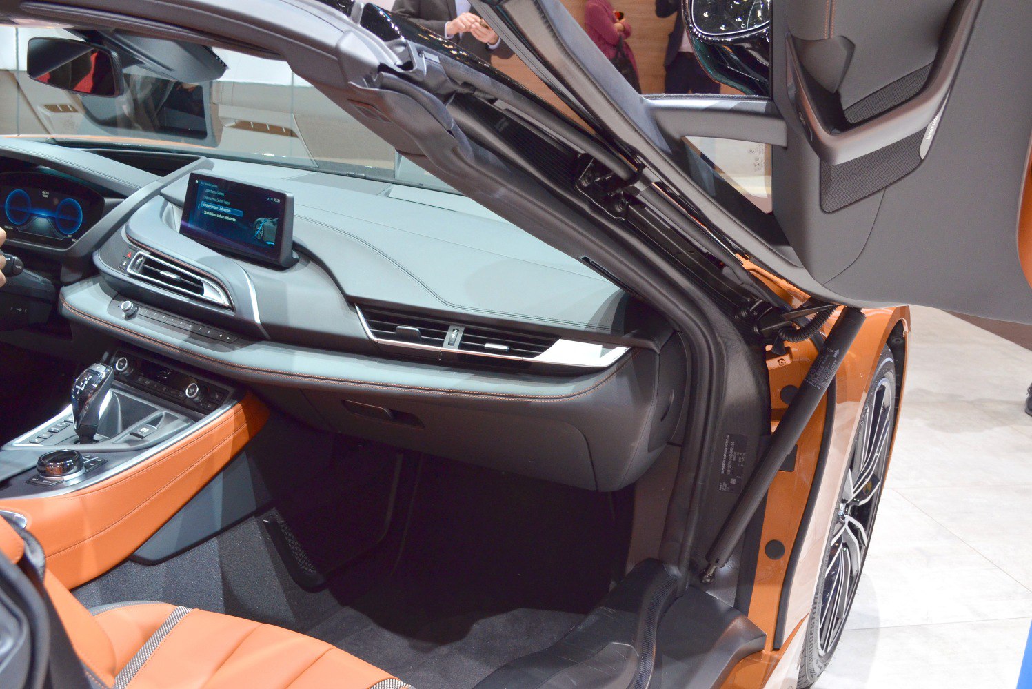 Digital dashboard, premium leather seats, gullwing door mechanism