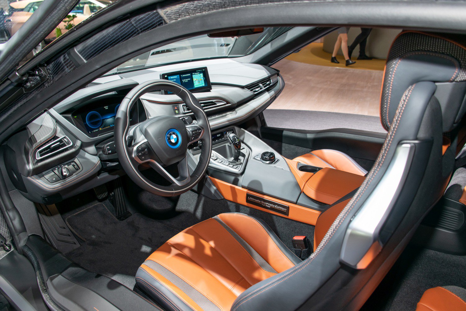 Luxury sports car interior with digital displays and leather seating