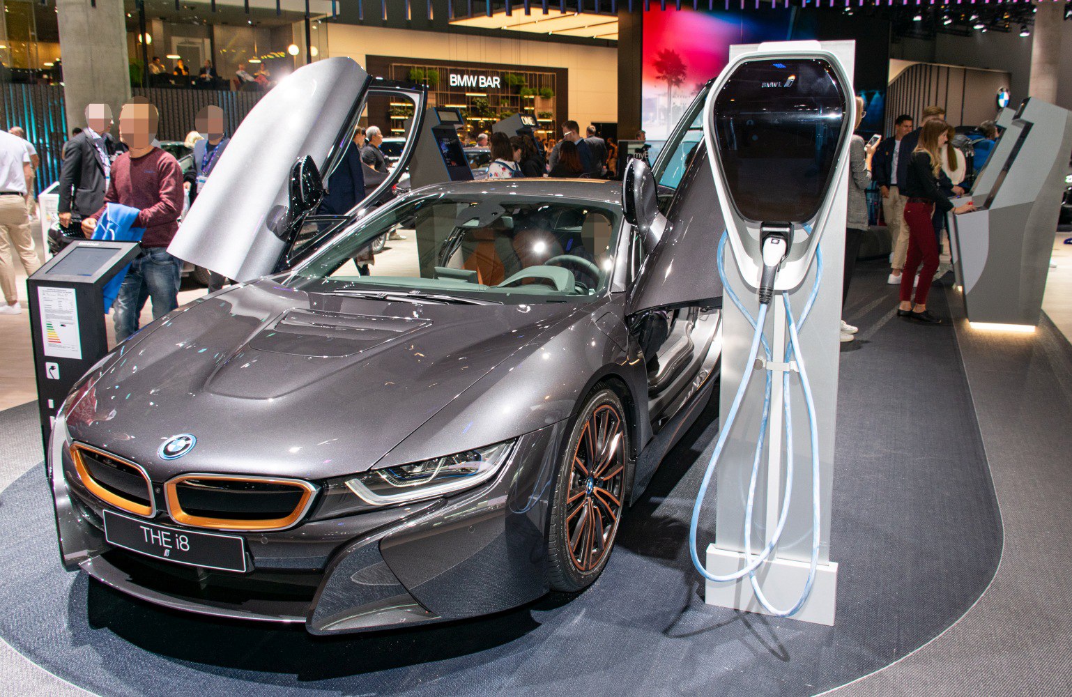 Butterfly doors and electric charging station of a luxury hybrid coupe