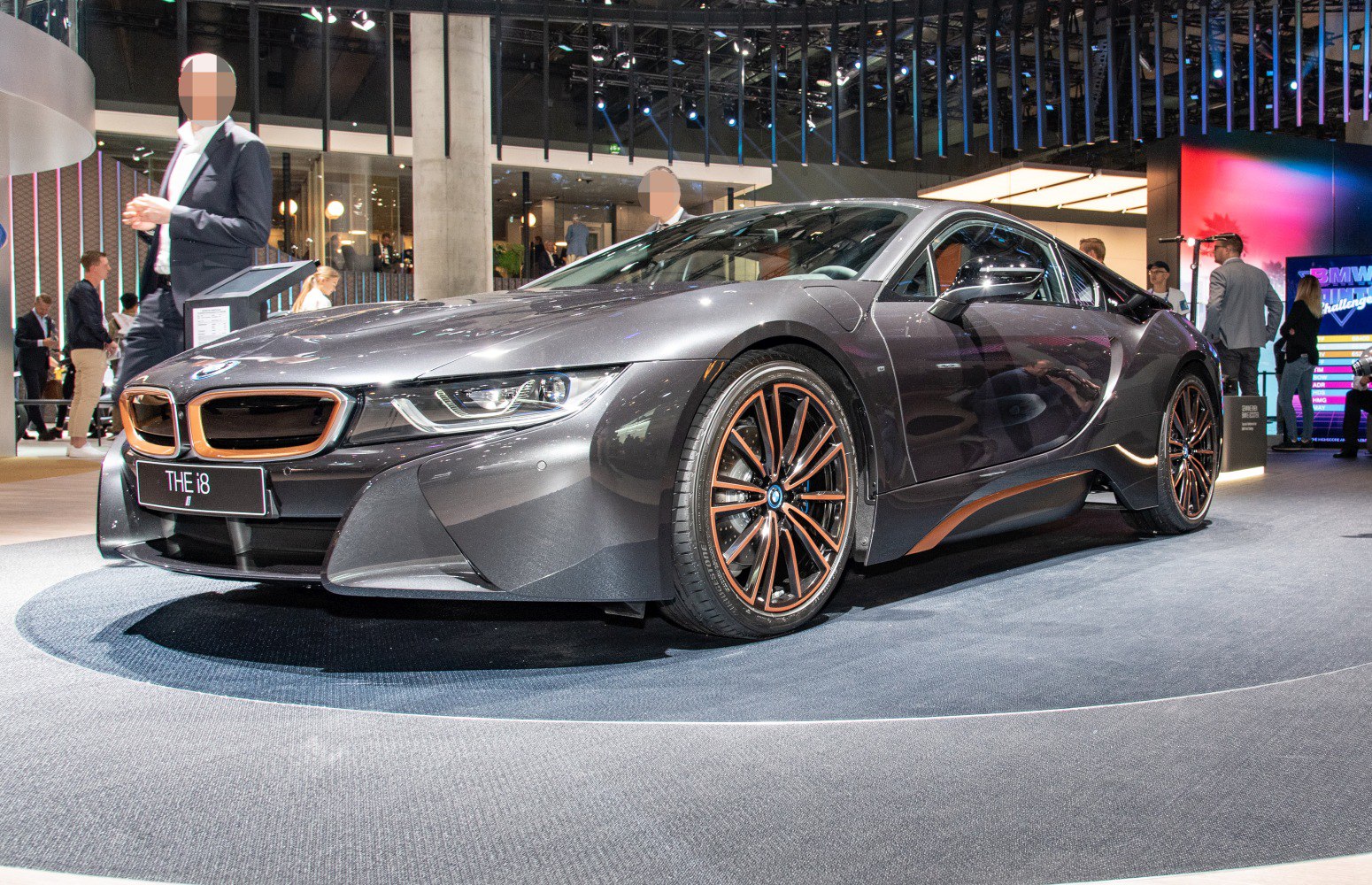 Futuristic headlights and unique alloy wheels on sports coupe