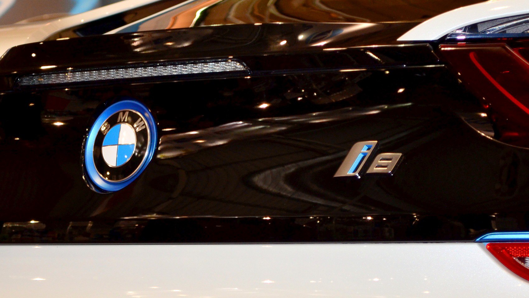 Close-up of BMW emblem and i8 badge on rear panel