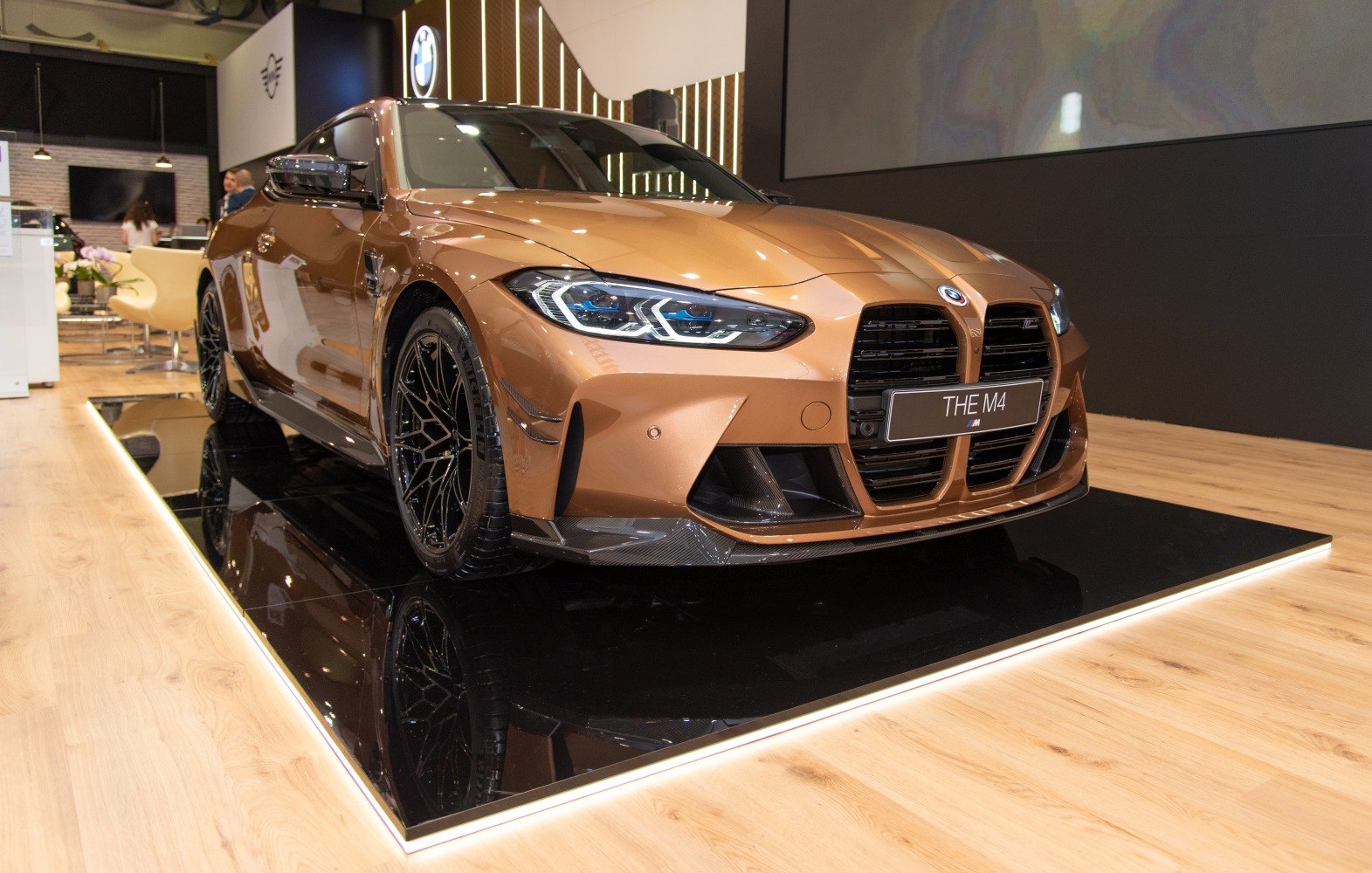 Front view showing aggressive kidney grille and sleek LED headlights