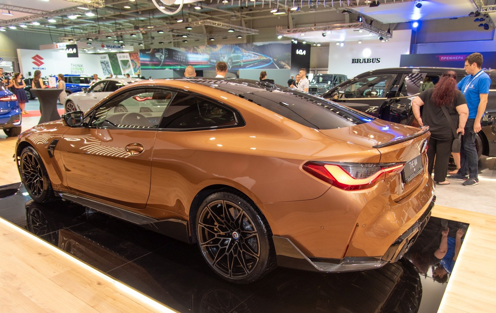 Sleek coupe rear view with sporty wheels and sharp taillights