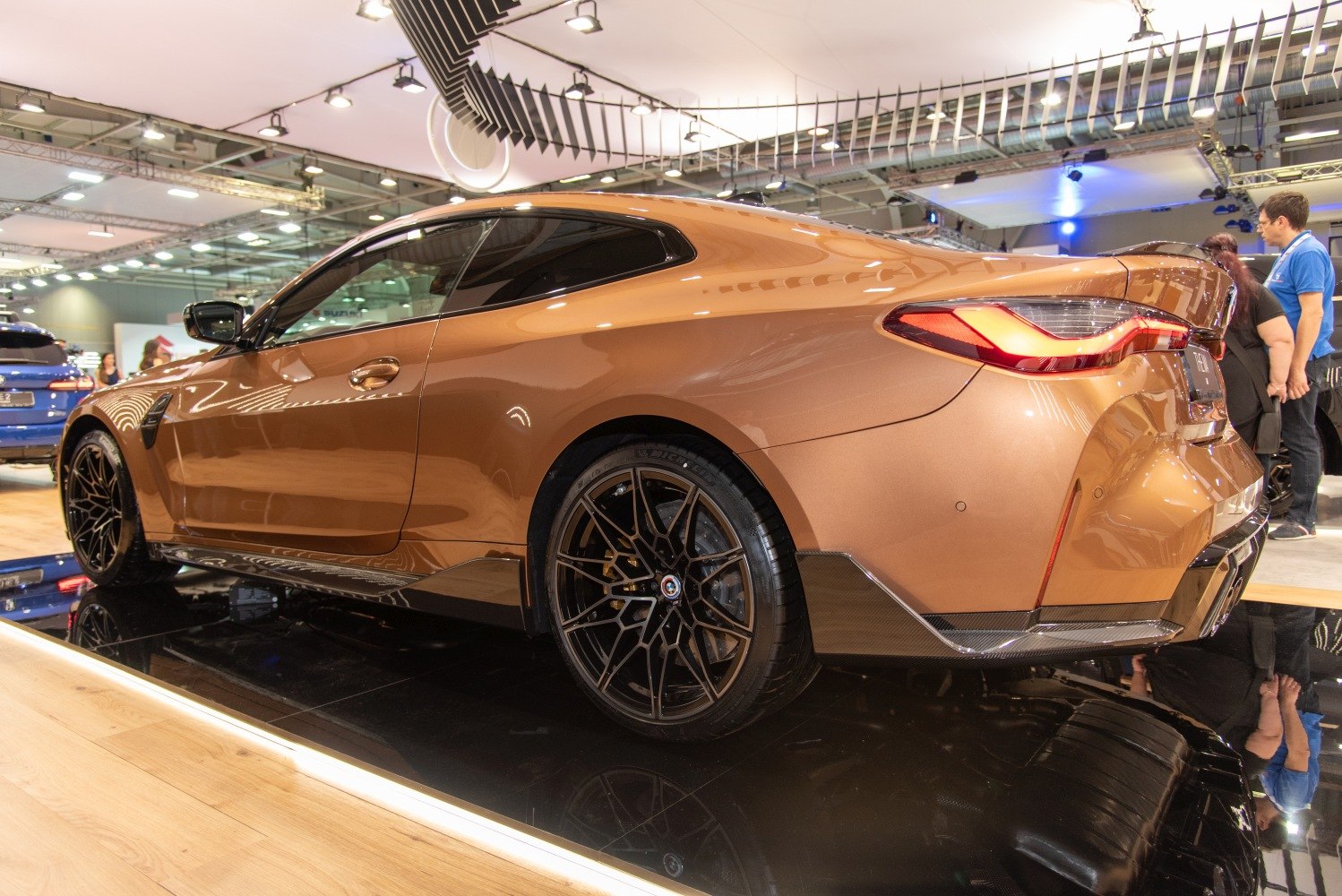 Rear and side profile of a modern sports coupe with alloy wheels
