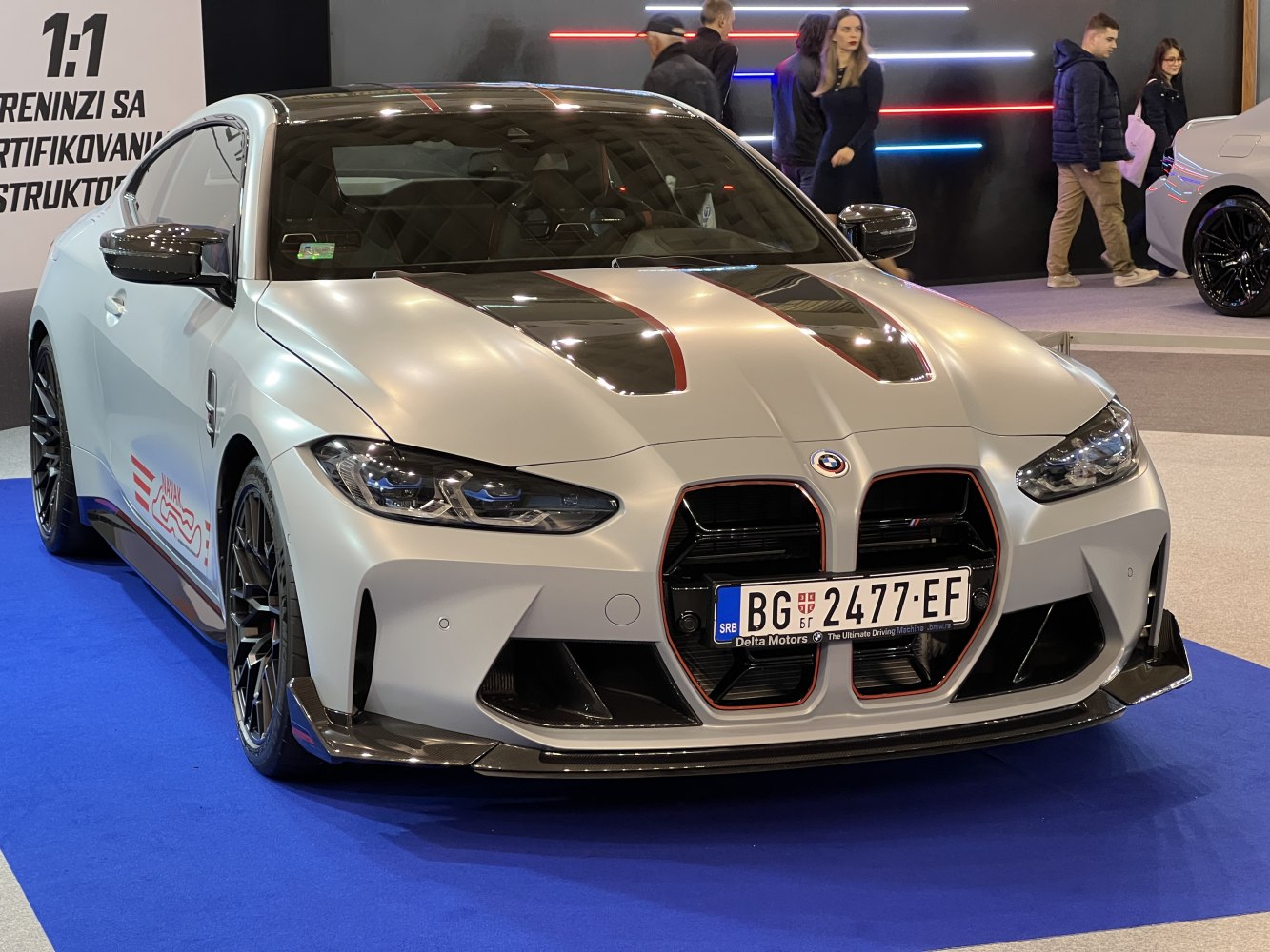 Aerodynamic carbon fiber front with aggressive grille and headlights