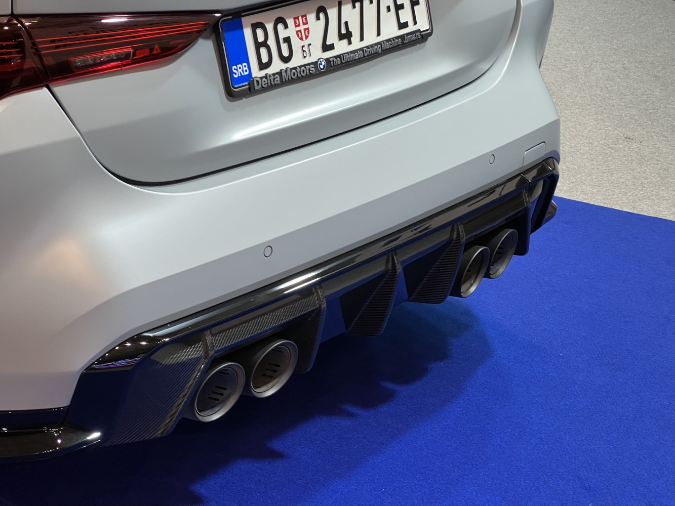 Rear carbon fiber diffuser and quad exhaust tips