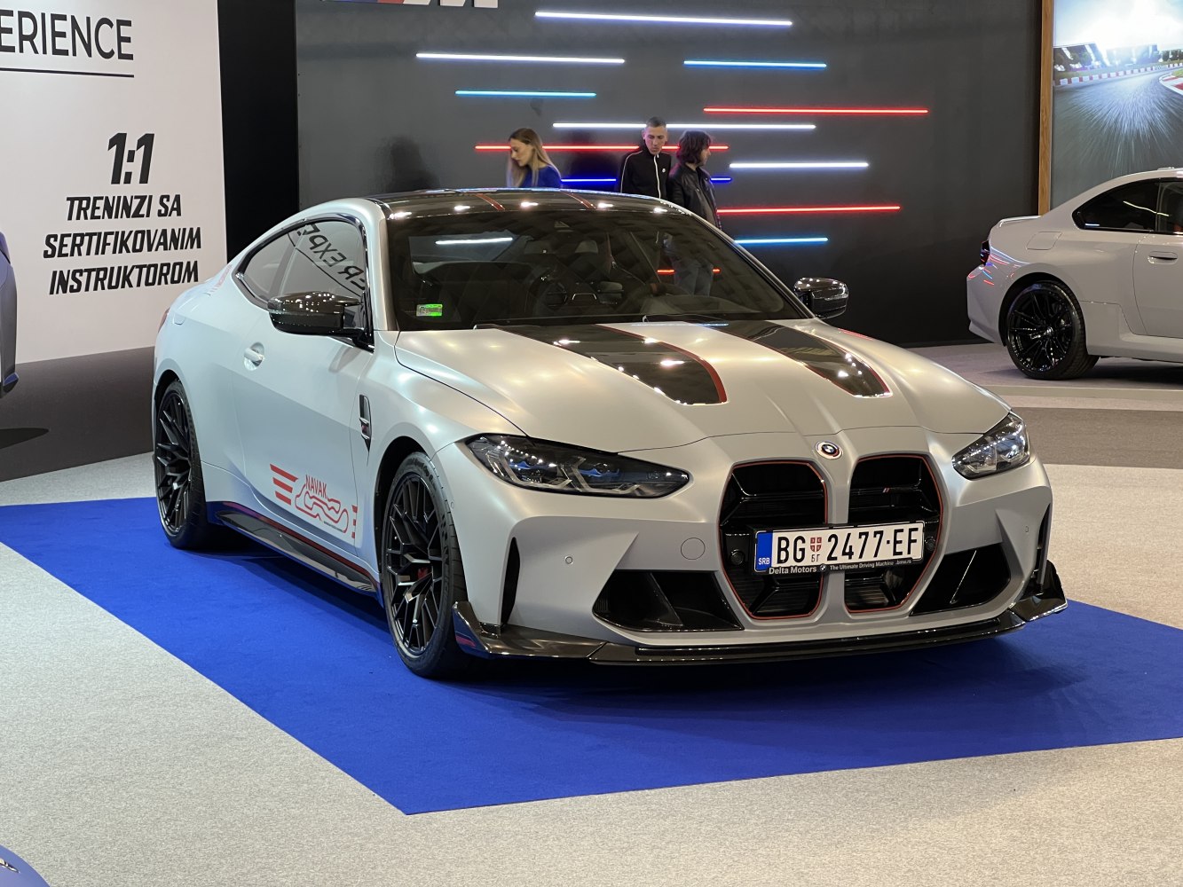 Carbon fiber hood with air vents and large aggressive front grille