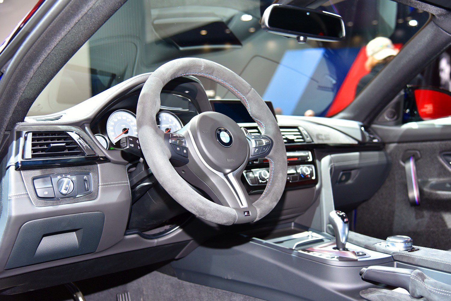 Alcantara-wrapped steering wheel and gear shifter with digital instrument cluster