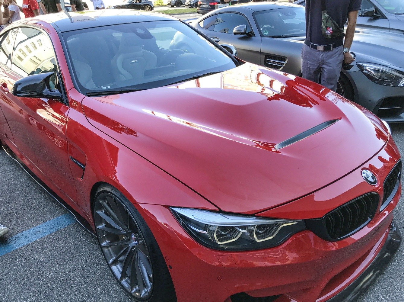 Aggressive front end, sharp headlights, sporty hood vent, large alloy wheels