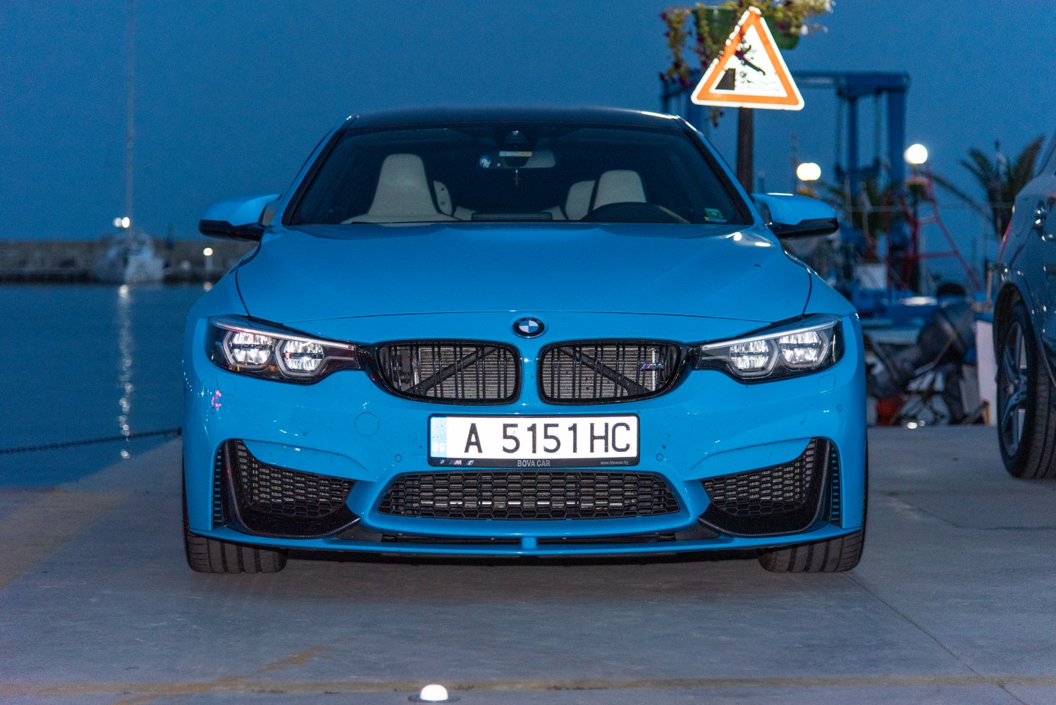 Aggressive headlights and mesh grille on a sporty front end
