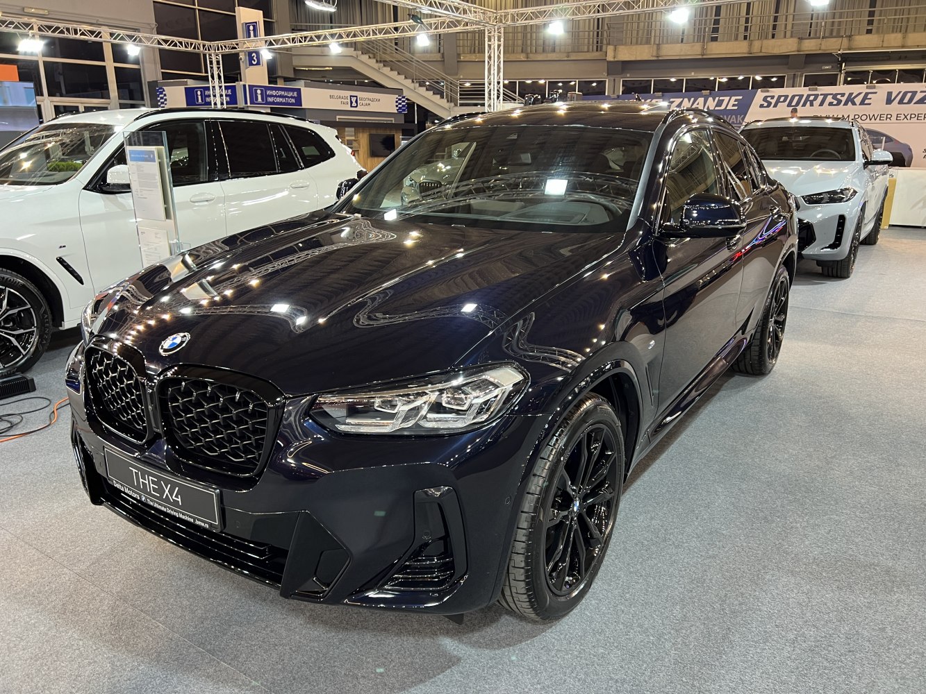 Black BMW SUV with kidney grille and black multi-spoke alloy wheels