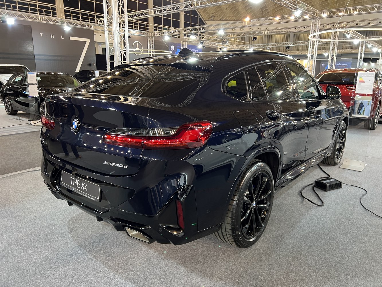 Rear-side view of SUV with sleek taillights and black alloy wheels