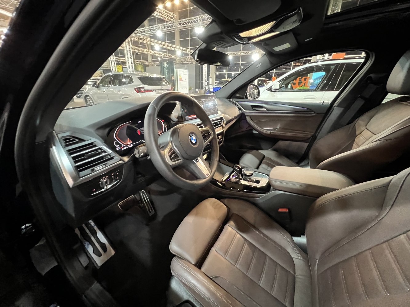 Dashboard, steering wheel, and front seats in modern SUV interior