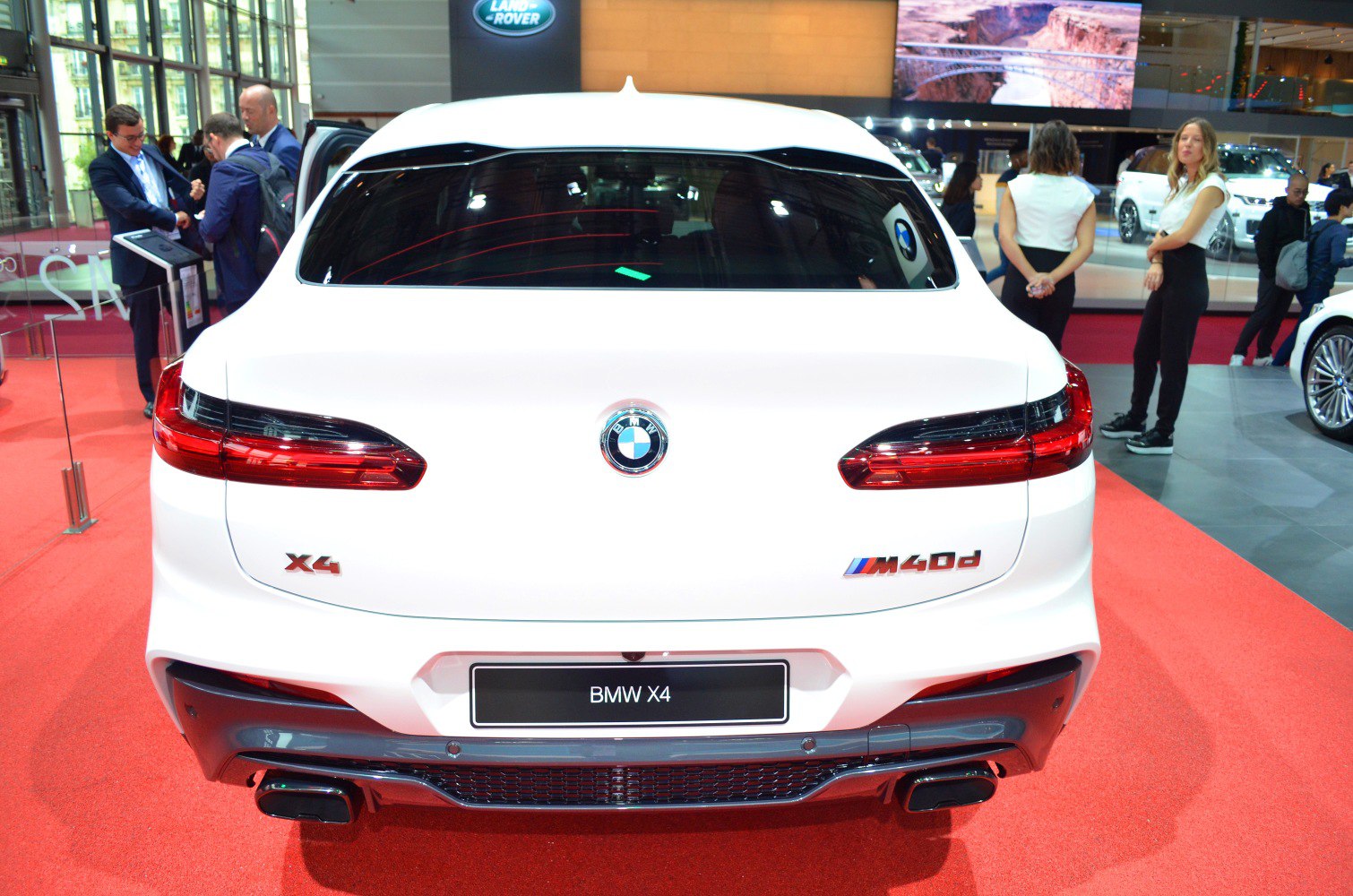 Rear view with taillights and dual exhaust of a sport SUV