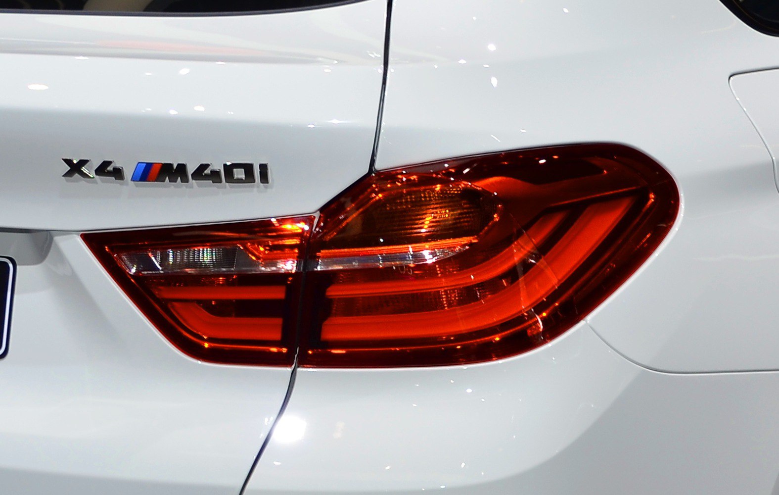 Close-up of rear badge and tail light assembly