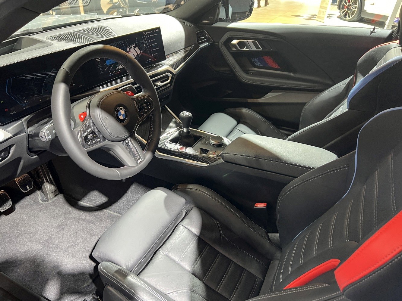 Manual transmission, digital cockpit, sport seats with contrast stitching