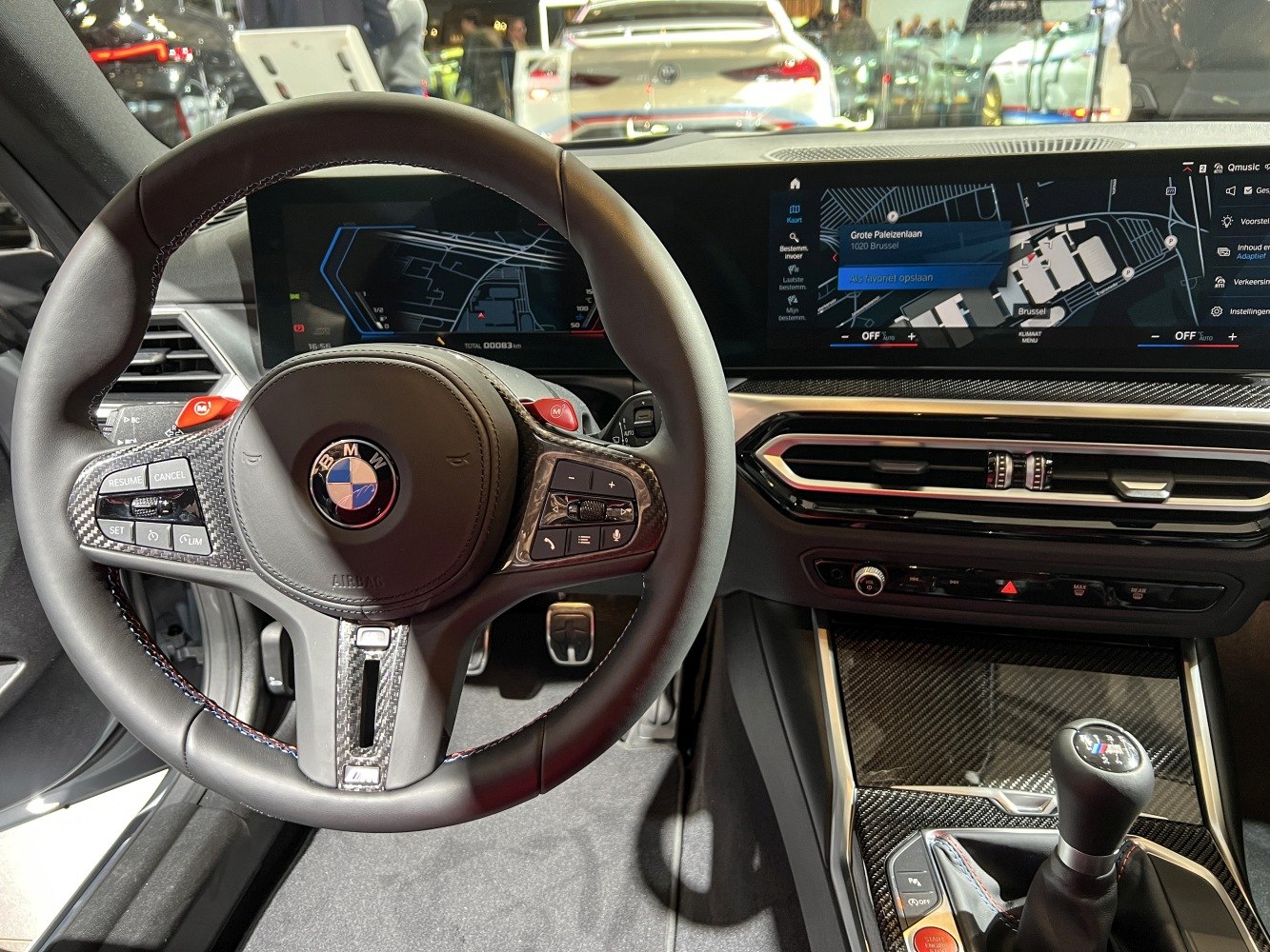 Leather steering wheel and carbon fiber interior trim with digital displays