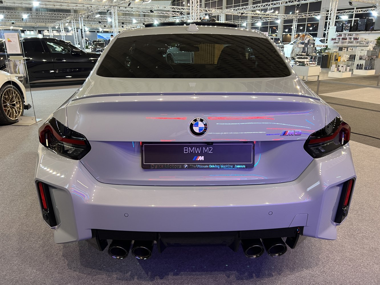 Sporty rear design with quad exhaust pipes and LED tail lights