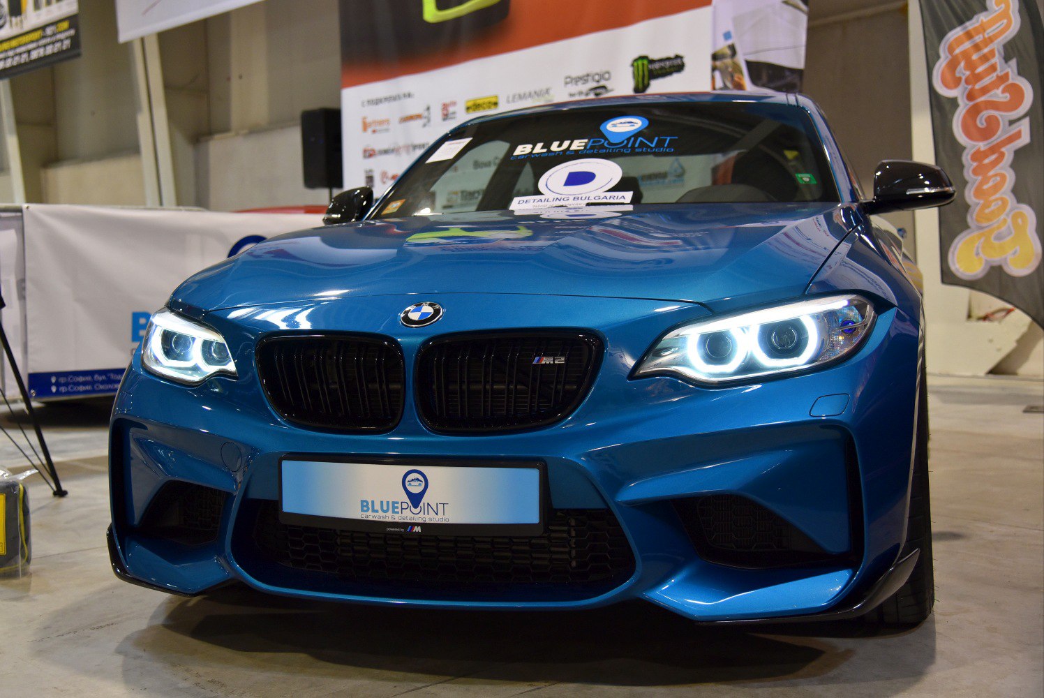 BMW M2 coupe front with kidney grille and bright LED headlights