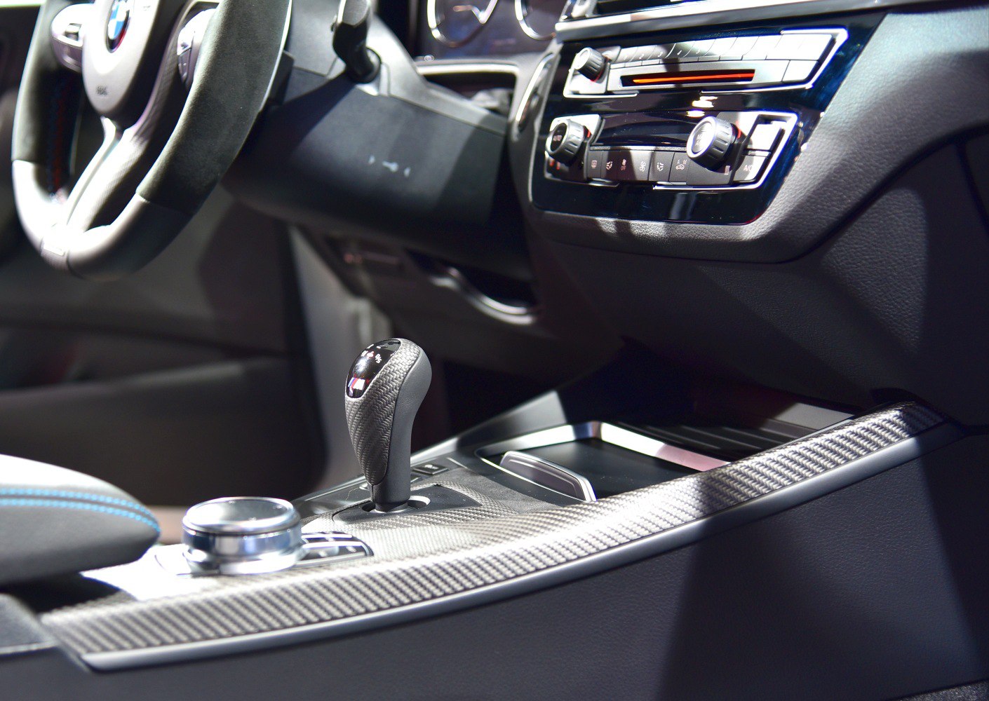 Carbon fiber center console and manual gear shifter close-up