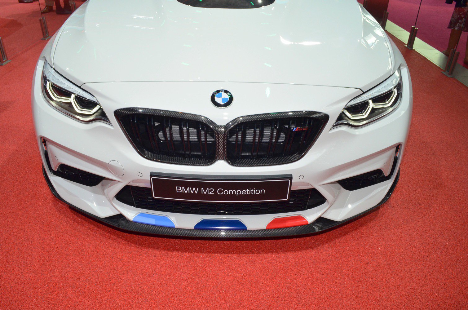 Close-up of BMW M2 Competition front grille and LED headlights