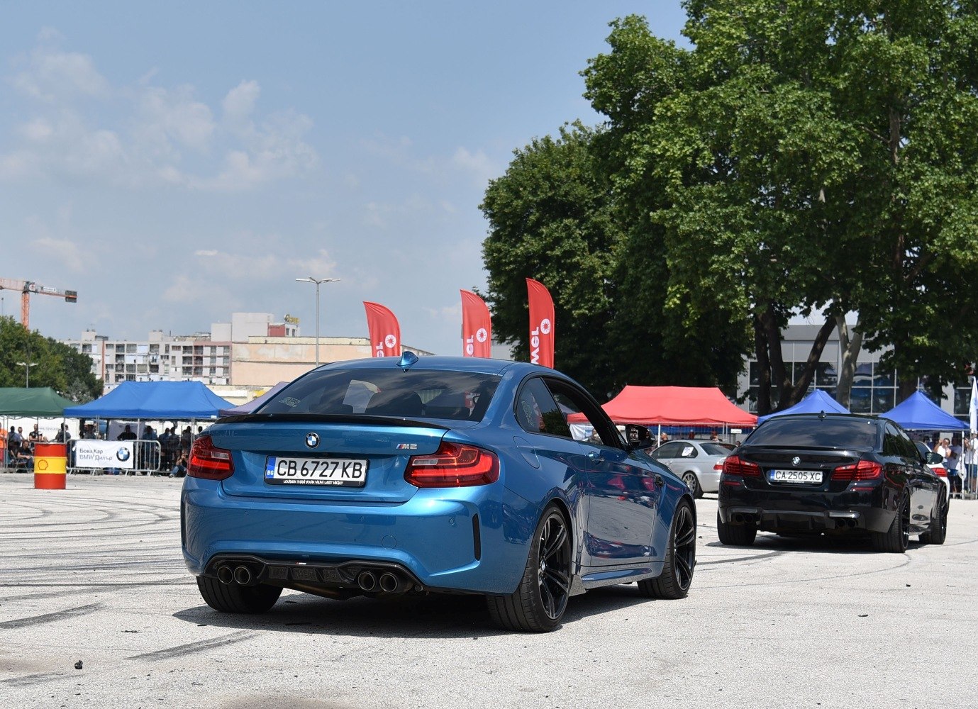 Blue coupe rear with quad exhausts and diffuser
