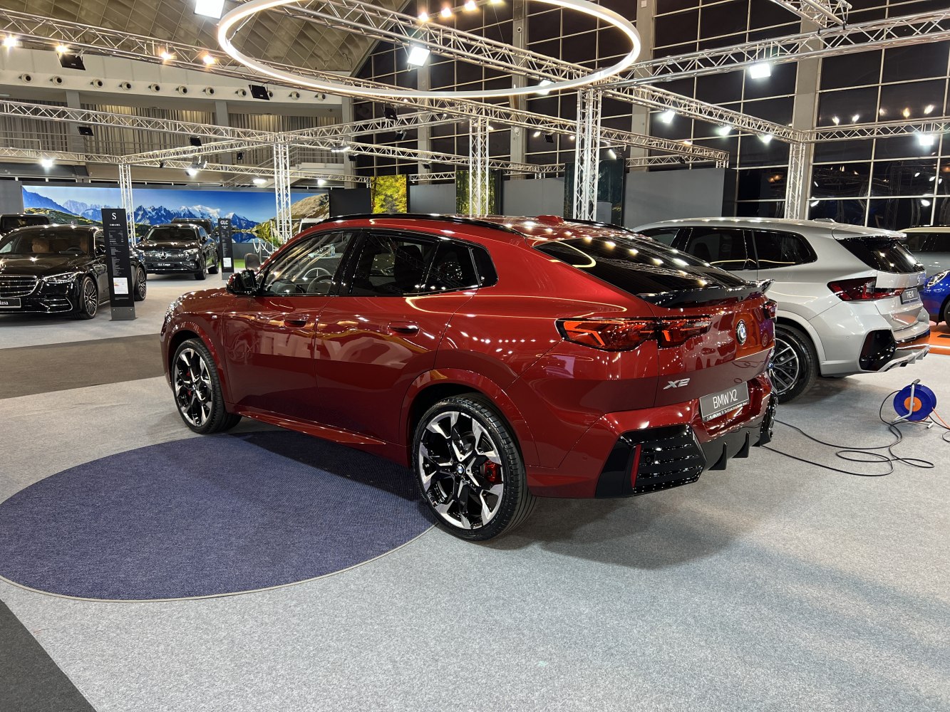 Sporty rear design with detailed tail lights and alloy wheels