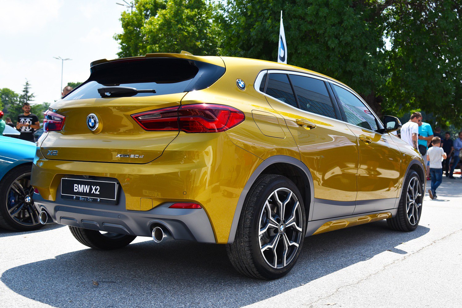 Rear and side profile with dual exhaust and distinctive alloy wheels